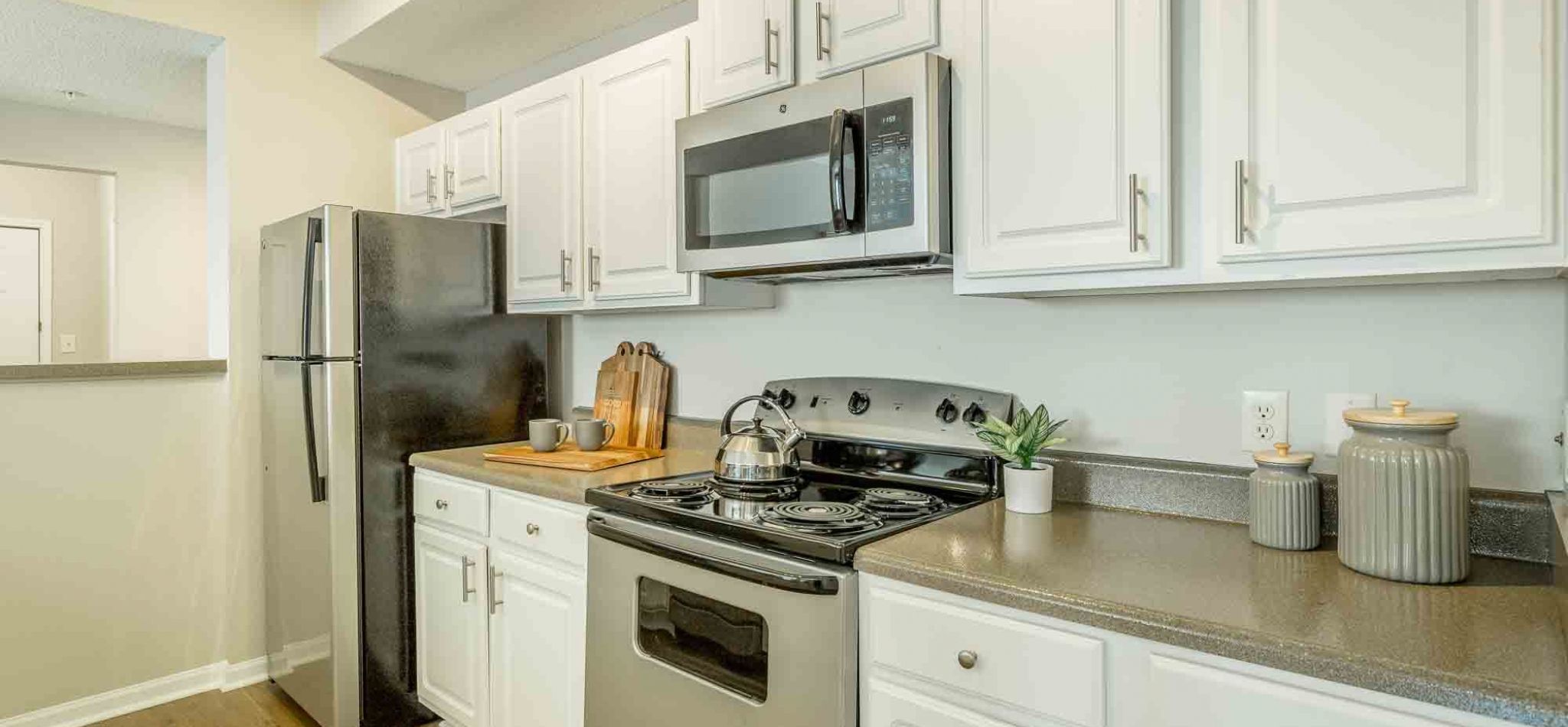Hawthorne at Lake Heather beautiful apartment kitchen with stainless steel appliances and ample cabinet space.